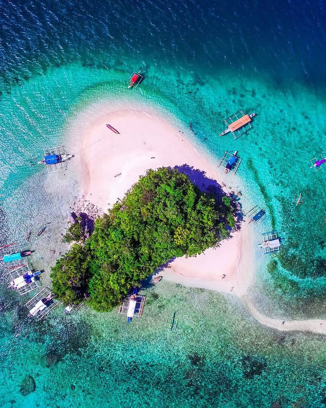 Aerial view of Guyam Island in Siargao