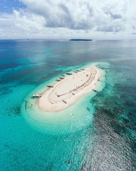 Breathtaking aerial view of Naked Island sandbar in Siargao